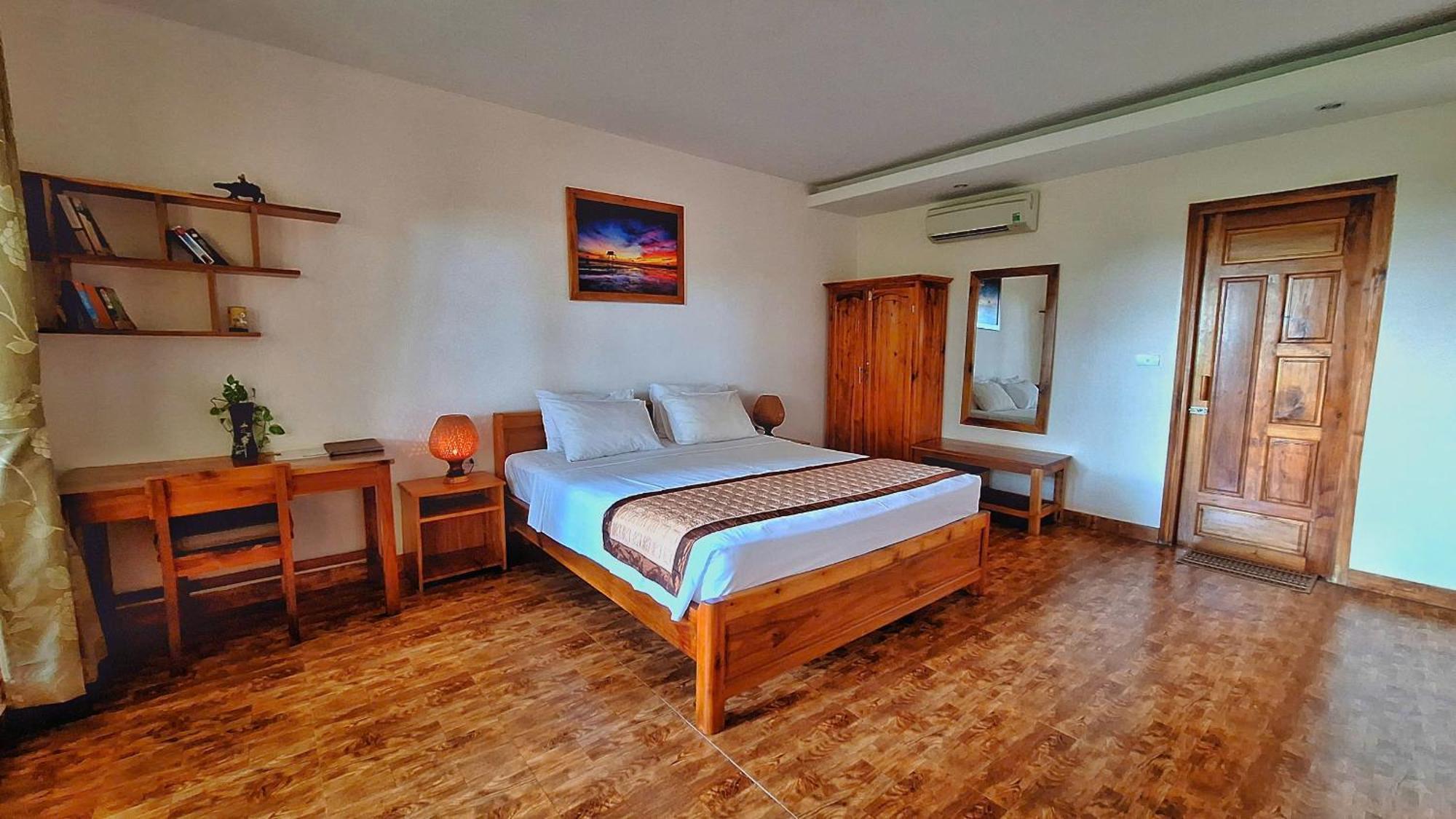 Deluxe Doppelzimmer mit Gartenblick